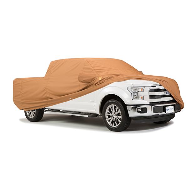 White truck with tan cover